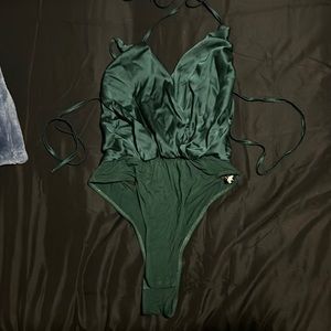 Dark green body suit with open back with ties